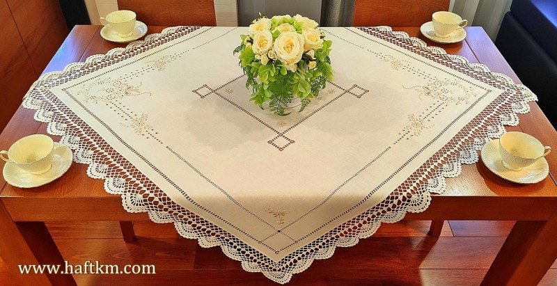 Elegant tablecloth with handmade crochet lace.