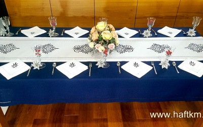 Luxurious, hand-embroidered linen tablecloth.